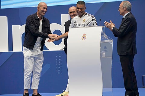 Zinedine Zidane, Kylian Mbappe and Real Madrid President Florentino Perez